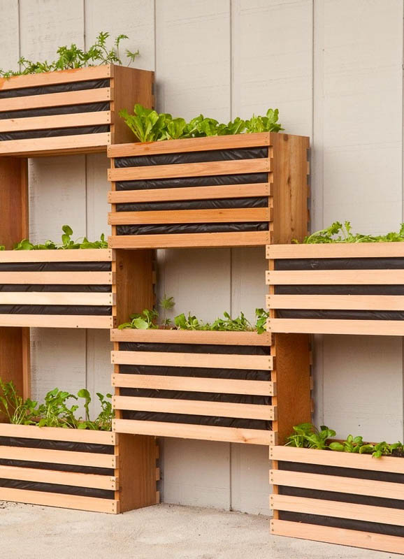 DIY free-standing vertical wall garden that looks like crates attached to each other