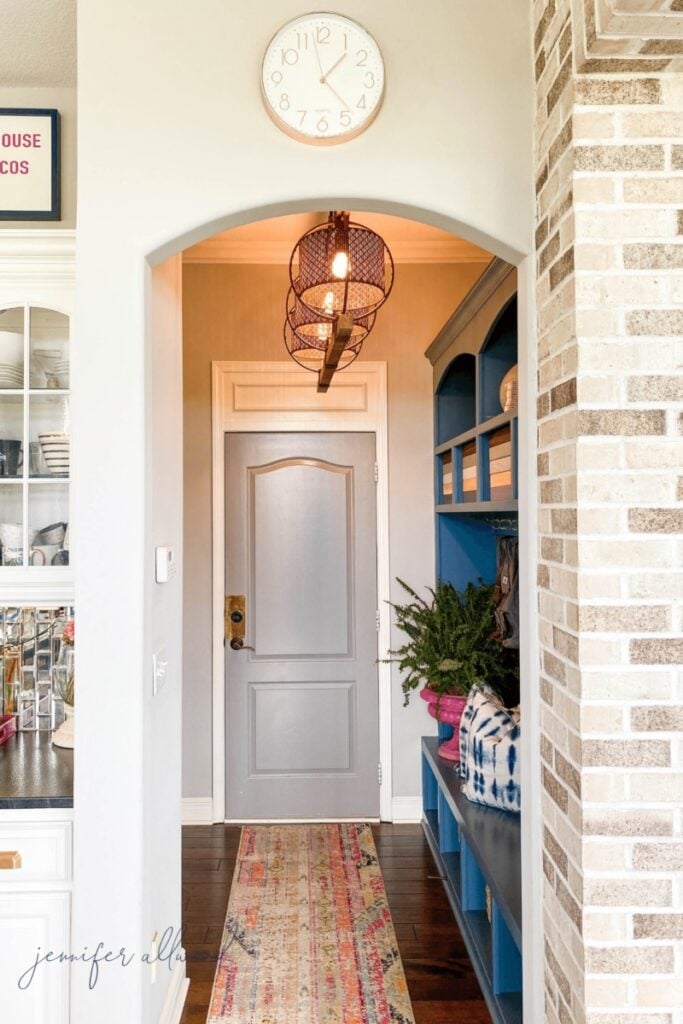 Light French Gray walls in a mudroom hallway
