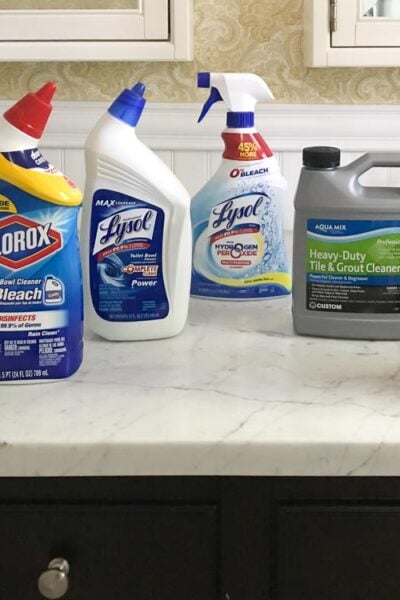 6 products tested in our best grout cleaner experiment shown on bathroom vanity