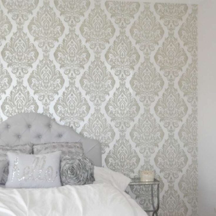 gray and glam painted accent wall in bedroom