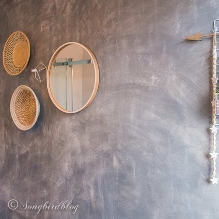 faux painted concrete wall with baskets