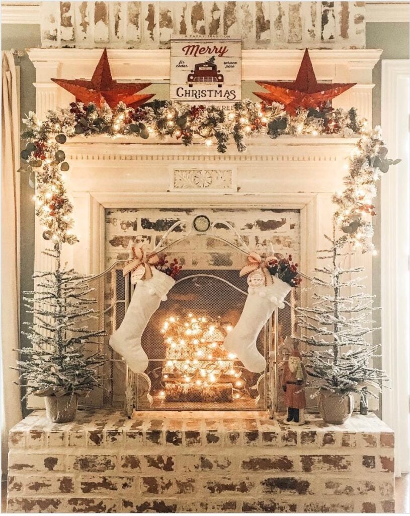 a fireplace with german smear decorated for Christmas