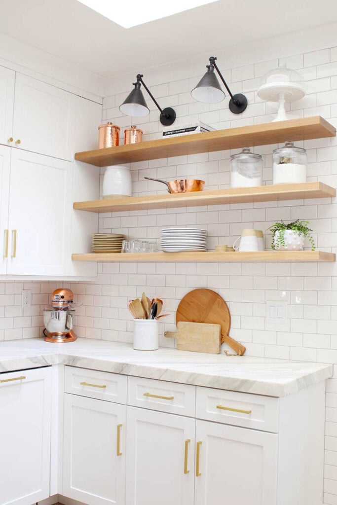 white kitchen with marbled counters